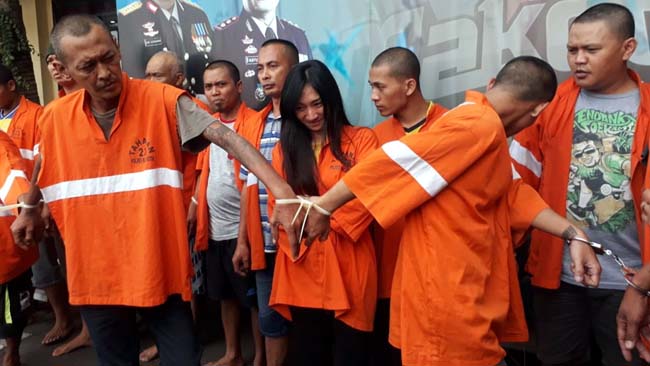 Tersangka Redi berada diantara para tersangka yangndirilis pada Kamis (1/8/2019) siang. (gie)