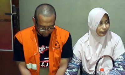 Agus Piranhamas bersama istri saat mediasi bersama wali murid di Mapolres Malang kota. (gie)