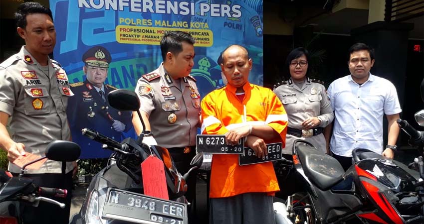 RANMOR : Tersangka Dwi Adi saat dirilis Kapolres Malang Kota AKBP Dony Alexander SIK MH. (gie)
