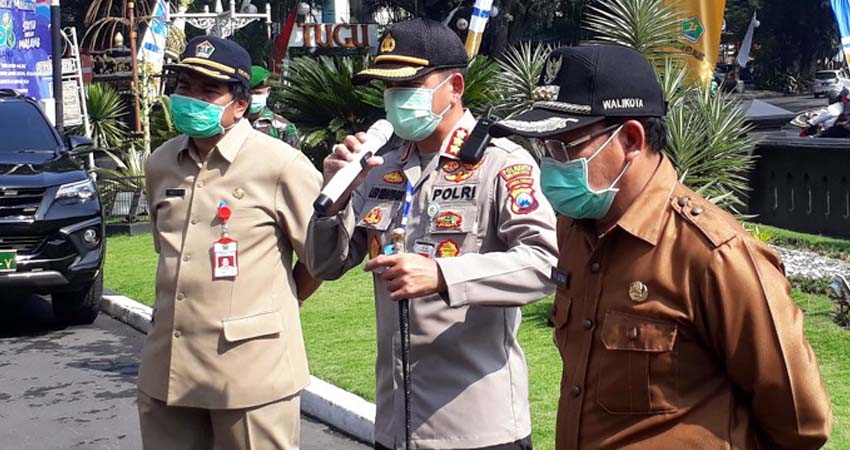 Kapolresta Malang Kombes Pol Dr Leonardus Harapantua Simarmata Permata D Sos SIK MH bersama Walikota Malang Drs H Sutiaji di Balaikota Malang. (gie)