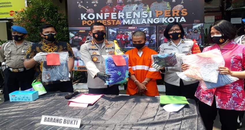 Tersangka SA alias Asul saat dirilis di Polresta Malang Kota. (gie)